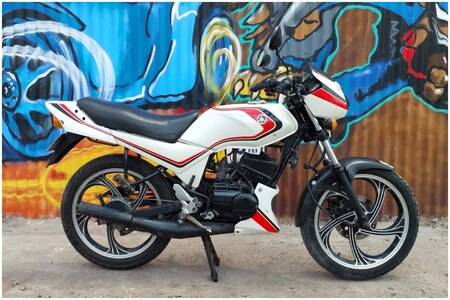 Rx 100 new model best sale bike price