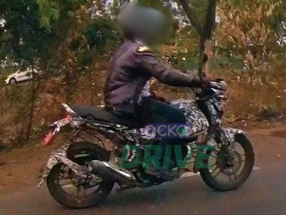 Bajaj CNG Bike Riding Side Profile 2